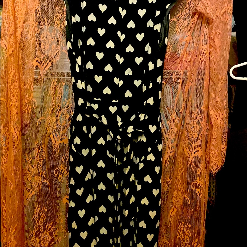 Short black fully lined heart dress.